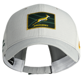 Introducing the Springboks 26/27 RGR Legacy 91 Club Cap by Nike—a gray baseball cap featuring a green and yellow Springboks logo patch on the front, a yellow Nike logo on the side, and an adjustable strap at the back. This classic cap is perfect for showcasing your rugby rivalry spirit.