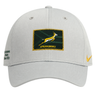 Introducing the Nike Springboks 26/27 Greatest Rivalry Legacy 91 Club Cap—a light grey baseball cap featuring a South African Rugby Springboks logo patch on the front and “The Greatest Rivalry Since 1921” printed on the side. This stylish Nike cap is perfect for celebrating rugby’s greatest rivalry.