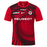 Red and black short-sleeved Stade Toulousain Home Pre-Match SS Top by Nike featuring sponsor logos and a team crest on the chest.