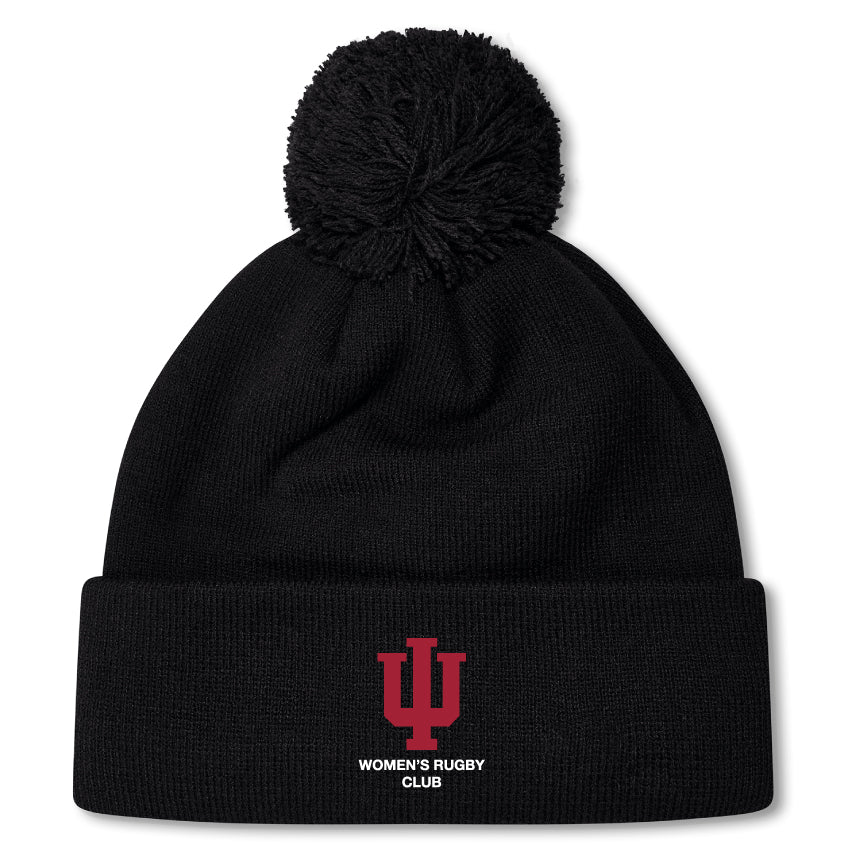 The EMB Canterbury Indiana University Women Pom Pom Beanie features a black knit design, fleece lining, a red IU logo, and "Women's Rugby Club" embroidered on the front cuff.
