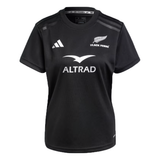 The Women's Black Ferns 24/25 Home Supporters T-Shirt by adidas showcases "Black Ferns" and "ALTRAD" logos, adidas branding, and a silver fern emblem. Equipped with AEROREADY technology for added comfort under pressure.