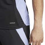 Close-up of a person wearing the Adidas All Blacks 24/25 Performance T-Shirt. The word "Aeroready" is visible on the fabric, highlighting the advanced AEROREADY technology.