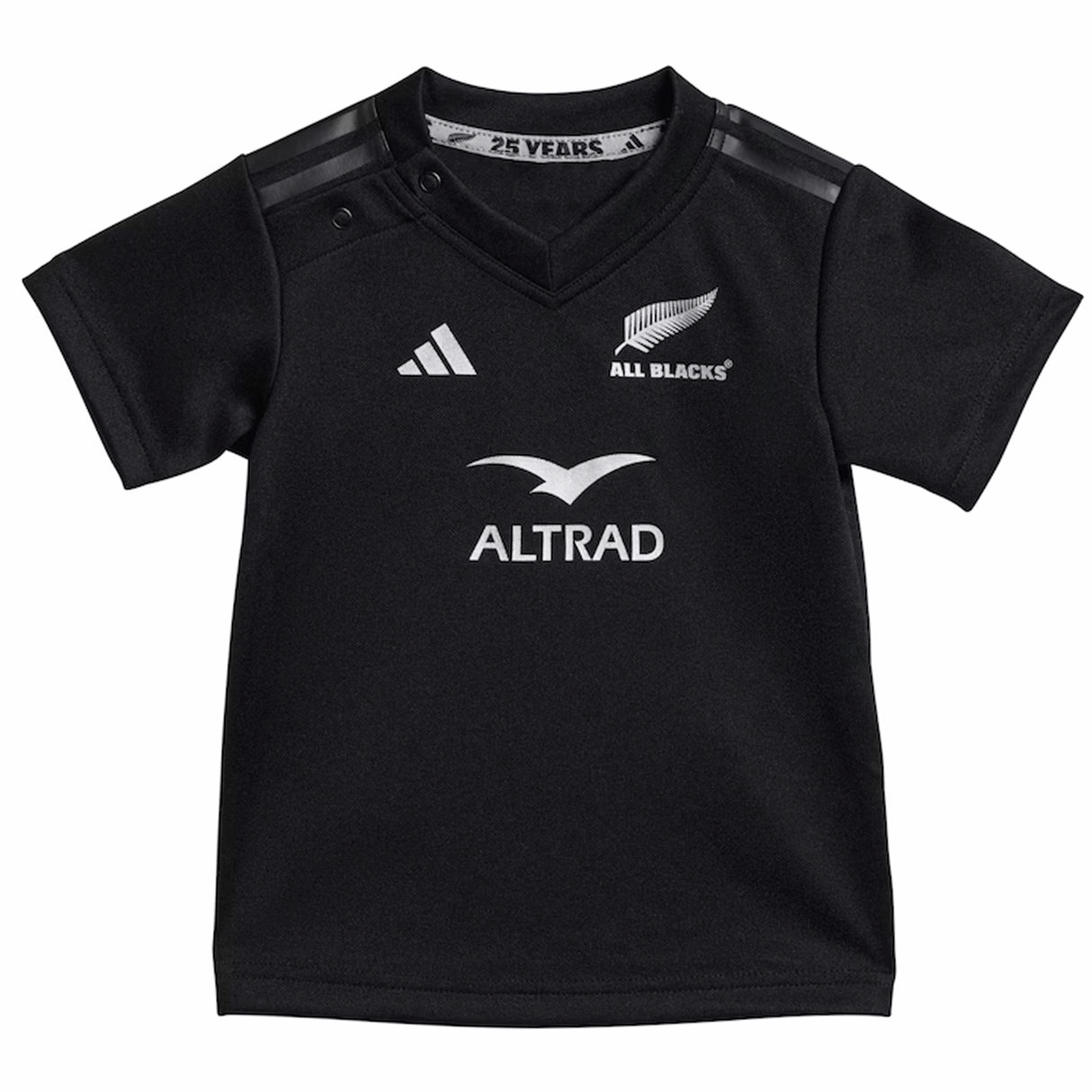 The Infant All Blacks 24/25 Home Kit by adidas features a black rugby jersey with logos "25 YEARS," "ALL BLACKS," and "ALTRAD." It has three white shoulder stripes, the adidas logo on the chest, and AEROREADY technology for enhanced comfort.