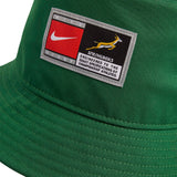 A green Nike Springboks Apex Bucket Hat featuring a rectangular patch with the team logo and text.