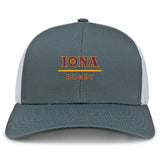The Iona College Retro Trucker Cap by EMB S&S Activewear is a gray and white cap with "IONA RUGBY" embroidered in red and gold on the front, and features a classic snapback closure.