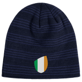 An Ireland Shield Beanie from EMB Canterbury, featuring navy blue stripes and an emblem with green, white, and orange vertical stripes.
