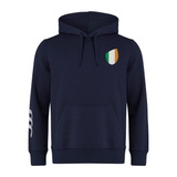 The EMB Canterbury Ireland Shield Club Hoodie, made from premium sweatshirt fleece, is navy with Canterbury branding on the sleeve. It includes a front pocket, drawstrings, and an eye-catching Irish flag shield design on the chest.