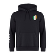 The Ireland Shield Club Hoodie by EMB Canterbury is a black masterpiece featuring a tricolor shield emblem on the chest and sleeve branding, crafted from premium sweatshirt fleece for ultimate comfort.