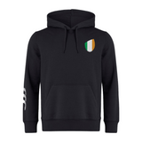 The Ireland Shield Club Hoodie by EMB Canterbury is a black masterpiece featuring a tricolor shield emblem on the chest and sleeve branding, crafted from premium sweatshirt fleece for ultimate comfort.