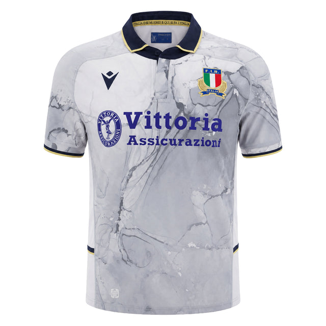 A gray marble-patterned Italy 25/26 Replica Away Jersey by Macron, featuring a black collar and cuffs, blue “Vittoria Assicurazioni” sponsor text, and the Italian rugby crest on the chest—ideal for fans seeking a stylish Italia Rugby Shirt or collectors looking to add an authentic Macron replica jersey to their lineup.
