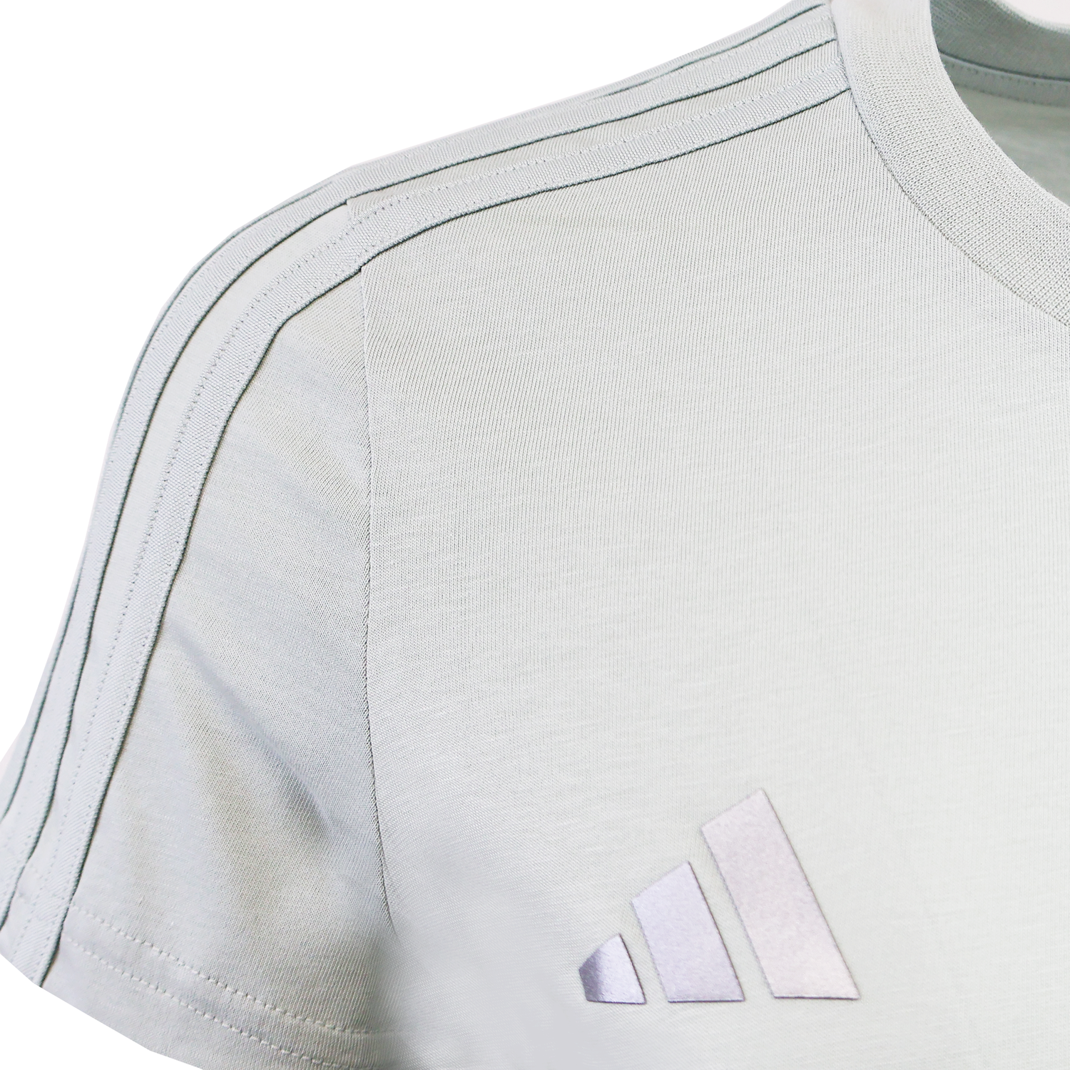 Close-up of the Women’s All Blacks 24/25 Fan Tee by adidas in light gray, featuring signature three stripes on the shoulder, adidas logo on the chest, and details inspired by New Zealand's team.