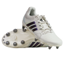 A pair of adidas Kakari Avaglide SG rugby boots in Off White/Grey Five, with one boot upright and the other displaying the metal-studded sole for soft ground play.