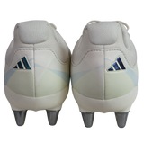 Rear view of adidas Kakari Avaglide SG rugby boots in Off White/Grey Five/Off White, featuring blue adidas logos and metallic soft ground studs, displayed on a plain white background.