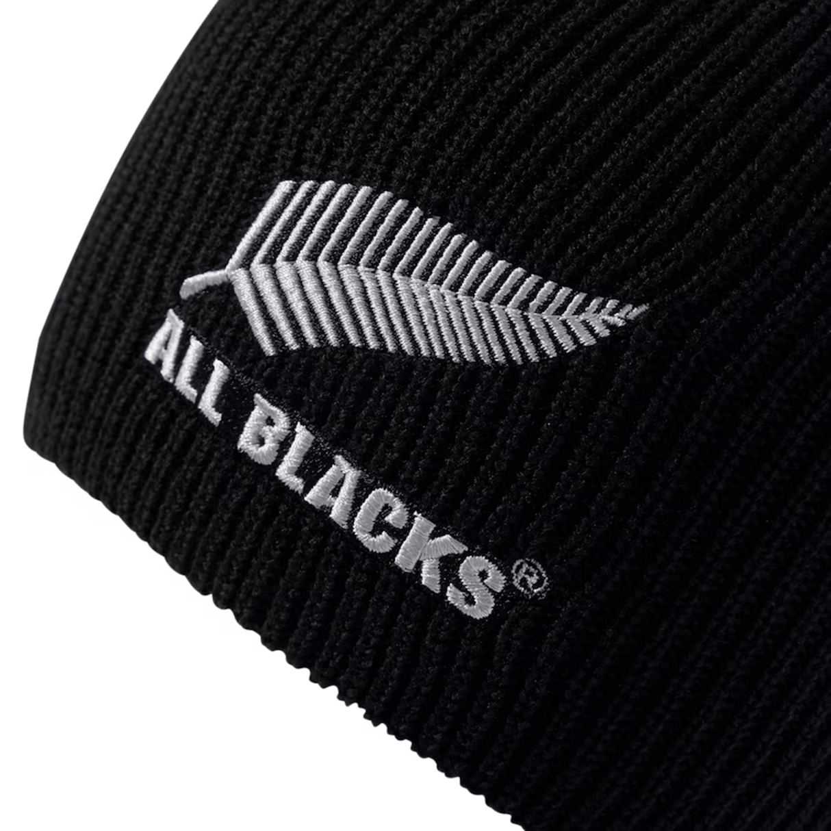 The All Blacks 24/25 Beanie by adidas features an embroidered silver fern along with the bold "ALL BLACKS" text, making it a great choice for rugby fans.