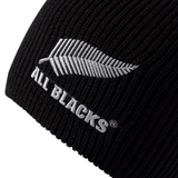 The All Blacks 24/25 Beanie by adidas features an embroidered silver fern along with the bold "ALL BLACKS" text, making it a great choice for rugby fans.