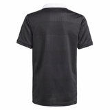 The adidas Youth All Blacks 25/26 Replica Home Jersey is shown from the back, featuring a black design with a white collar and subtle dotted and striped patterns inspired by the classic All Blacks jersey.
