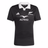 The All Blacks 25/26 Performance Home Jersey by adidas is a black rugby jersey with a white collar, featuring the All Blacks logo, adidas branding, and "ALTRAD" sponsor text on the front.
