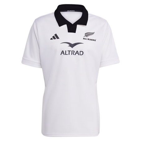 The adidas All Blacks 25/26 Replica Away Jersey features a white design with a black collar, team and sponsor logos, and adidas branding—ideal as an official All Blacks away rugby jersey.