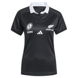 The Women's Black Ferns WRWC25 Replica Home Jersey by adidas features a white collar and displays the Women's Rugby World Cup and Black Ferns logos on the chest—a perfect replica for fans.