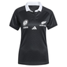 The Women's Black Ferns WRWC25 Replica Home Jersey by adidas features a white collar and displays the Women's Rugby World Cup and Black Ferns logos on the chest—a perfect replica for fans.