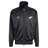 The Originals Limited Edition All Blacks Firebird Track Top by adidas is a black, recycled polyester track jacket with a zip-up front and high collar. Featuring a white fern emblem, it combines iconic design with functionality and sustainable style.