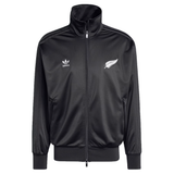 The Originals Limited Edition All Blacks Firebird Track Top by adidas is a black, recycled polyester track jacket with a zip-up front and high collar. Featuring a white fern emblem, it combines iconic design with functionality and sustainable style.