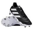 A pair of adidas Kakari Elite SG boots in Core Black/White/Core Black—one upright, one on its side revealing metal studs—ideal for soft ground play and showcasing the classic adidas rugby design.