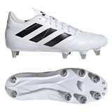 The adidas Kakari SG rugby boots in White/Core Black/Silver Metallic feature six metal studs on the sole for improved traction on soft ground, with black stripes and side and bottom views shown.