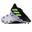 A pair of adidas Kakari SG rugby boots in Core Black/Lucid Lemon/White, featuring neon stripes and metal studs for soft ground—one boot upright, the other showing the sole.