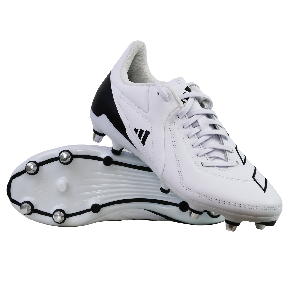 A pair of adidas RS15 Elite SG rugby boots in White/White/Core Black are shown on a plain white background, with one upright and one displaying the metal-studded sole.