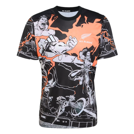 The All Blacks 26/27 Captains Run Replica Jersey by adidas features dynamic black and orange comic-style graphics and displays the adidas "All Blacks" logo on the chest.