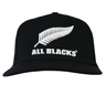 The adidas All Blacks 25/26 Snapback Cap is black with a white embroidered fern, adidas branding, and "ALL BLACKS" embroidered on the front.