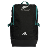 The All Blacks 25/26 Backpack by adidas features teal straps, “ALL BLACKS” text, a silver fern logo on top, and the adidas logo at the bottom—perfect for rugby fans and everyday use.