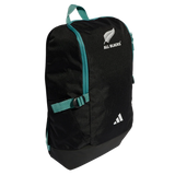 The All Blacks 25/26 Backpack by adidas features teal accents, adjustable straps, a zippered main compartment, and bold adidas and All Blacks logos on the front. Ideal for rugby fans seeking style and function.