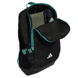 The All Blacks 25/26 Backpack by adidas is open to reveal a laptop and blue adidas water bottle inside, making it the ideal rugby backpack for school or training.