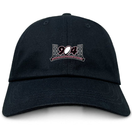 The Jacksonville Women's Rugby Adult Low-Profile Cotton Twill Dad Cap by EMB S&S Activewear is a black dad cap with "904" and a bridge graphic embroidered on the front.