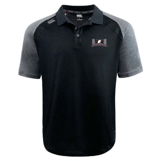 The Jacksonville Women's Rugby Elite Polo by Canterbury, in black and gray, features short sleeves and a logo on the left chest. It has a collared design with three buttons down the front and is crafted from Vapodri fabrics for enhanced comfort.