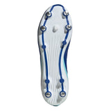 The image displays the underside of the adidas RS-15 SG rugby boots in Royal/White/Light Blue by adidas, featuring eight metal studs and a blue design on a white sole—making them ideal soft ground rugby boots for optimal grip.
