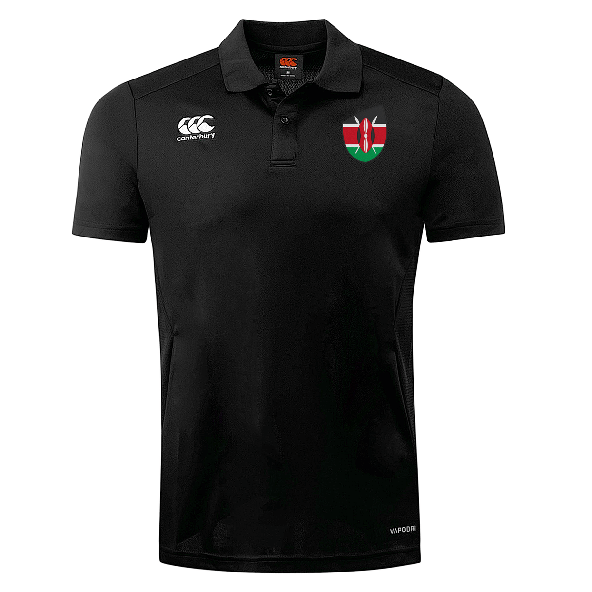 Black Kenya Shield Club Dry Polo featuring a red and green Kenya Shield Club emblem on the left chest and the EMB Canterbury logo on the right, with a collared neckline and short sleeves.