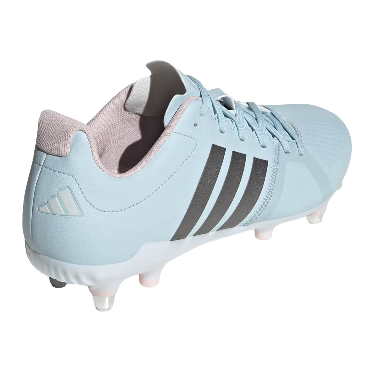 The adidas RS-15 Avaglide Rise SG rugby boots in Ice Blue, Iron, and Pink feature black stripes, metal studs, and a pink interior. Shown from a rear side angle on a white background, these stylish soft ground boots are designed for women who want both performance and flair on the pitch.