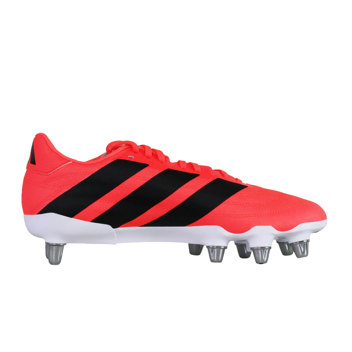 An adidas-Kakari SG Rugby Boot in pink with black stripes and white accents is displayed in a side view on a white background, showcasing the classic adidas design built for performance on soft ground.