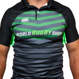 A person wearing a black and green Canterbury Elite Full Custom Sublimated Jersey - Mens by Teamatical, featuring branding on the front.