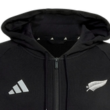 The All Blacks 26/27 Travel Full Zip Hoodie by adidas features a hood, adidas logo on the left, and white fern on the right—perfect for New Zealand rugby or All Blacks hoodie fans.