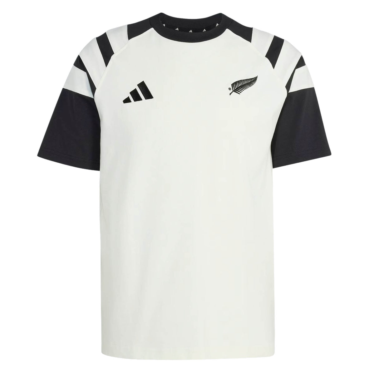 The All Blacks 26/27 Travel T-Shirt by adidas is a white and black short-sleeve shirt featuring a striking black fern and the adidas logo on the chest, along with bold black angled stripes on the shoulders—a classic look inspired by the iconic New Zealand rugby shirt.