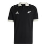 Wearing the All Blacks 26/27 Travel Polo by adidas, you’ll sport a black short-sleeve polo shirt with a crisp white collar and sleeve cuffs. Featuring the adidas logo on the right chest and the silver fern emblem on the left, this stylish top captures the spirit of the iconic New Zealand Rugby shirt.