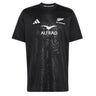 The All Blacks Greatest Rivalry Supporters Tee by adidas showcases the adidas, Altrad, and All Blacks logos on the front, features a subtle leaf pattern in black, and is an essential piece for every New Zealand rugby fan.