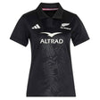Introducing the adidas Women’s All Blacks Greatest Rivalry Replica Home Jersey—a black short-sleeve rugby jersey showcasing the iconic All Blacks logo, Altrad sponsor, and a subtle fern pattern on the front. Finished with a white adidas logo on the right chest, this replica jersey combines classic style with modern performance.
