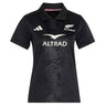 Introducing the adidas Women’s All Blacks Greatest Rivalry Replica Home Jersey—a black short-sleeve rugby jersey showcasing the iconic All Blacks logo, Altrad sponsor, and a subtle fern pattern on the front. Finished with a white adidas logo on the right chest, this replica jersey combines classic style with modern performance.