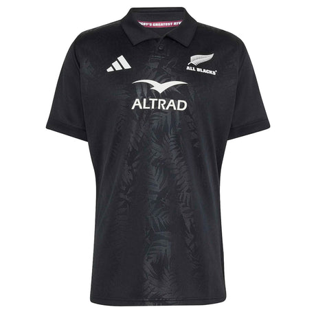 Introducing the All Blacks Greatest Rivalry Replica Home Jersey by adidas—a black rugby polo shirt adorned with adidas, Altrad, and All Blacks logos. Its subtle fern pattern on the front pays tribute to rugby heritage.