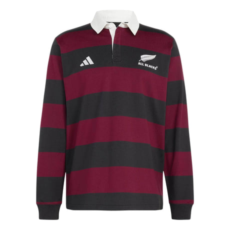 The All Blacks 26/27 Heritage LS Polo by adidas is a long-sleeve rugby shirt featuring wide maroon and black horizontal stripes, a crisp white collar, and embroidered logos—including adidas branding and the iconic All Blacks crest—celebrating New Zealand’s rich rugby heritage.
